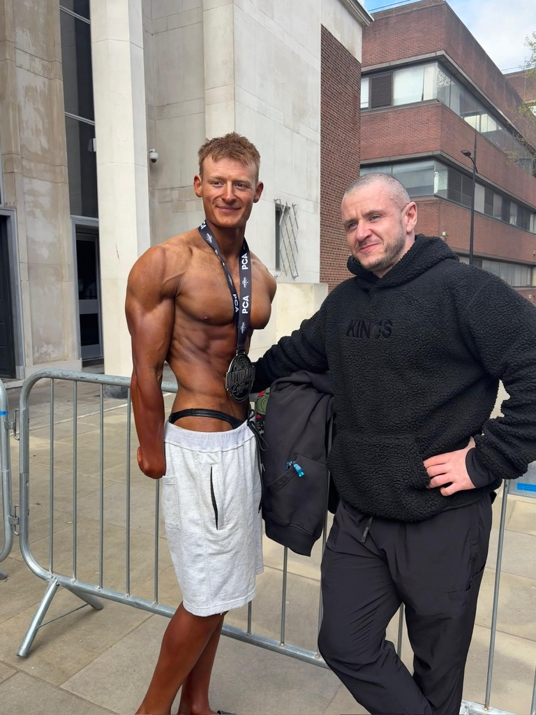 Danny Hewett with an A1 physique coaching client